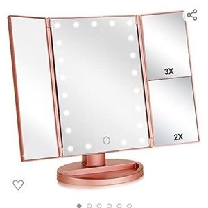 Trifold lighted mirror
